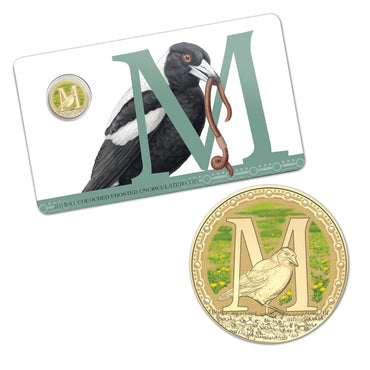 $1 2015 Coloured 'M' Alphabet Al-Bronze Coin