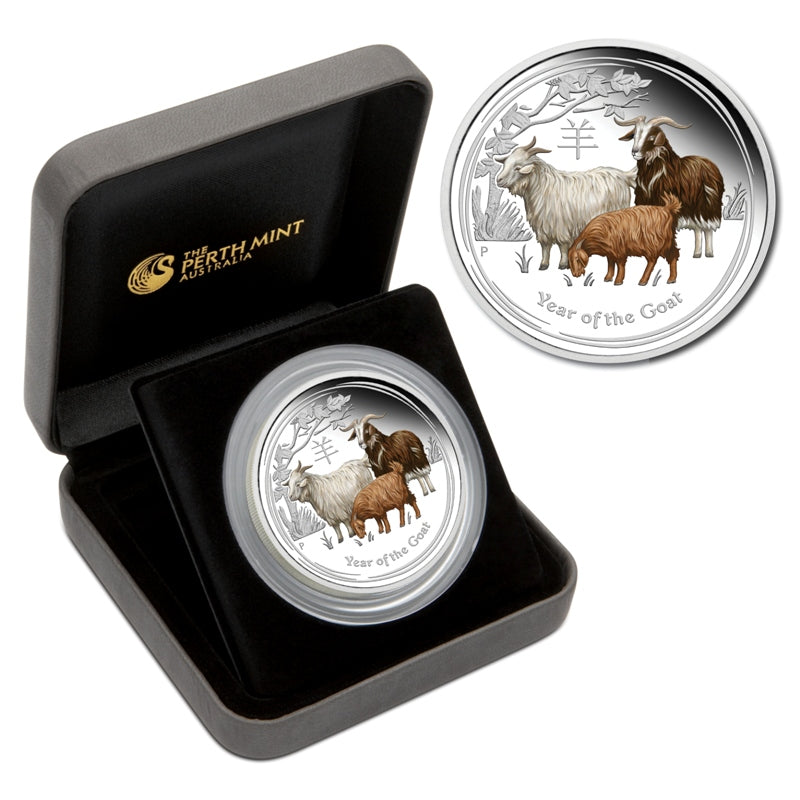 2015 Year of the Goat Coloured 2oz Silver Proof ANDA Show Special - coin and case | 2015 Year of the Goat Coloured 2oz Silver Proof ANDA Show Special - reverse | 2015 Year of the Goat Coloured 2oz Silver Proof ANDA Show Special - obverse | 2015 Year of the Goat Coloured 2oz Silver Proof ANDA Show Special - box