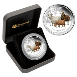 2015 Year of the Goat Coloured 2oz Silver Proof ANDA Show Special - coin and case | 2015 Year of the Goat Coloured 2oz Silver Proof ANDA Show Special - reverse | 2015 Year of the Goat Coloured 2oz Silver Proof ANDA Show Special - obverse | 2015 Year of the Goat Coloured 2oz Silver Proof ANDA Show Special - box